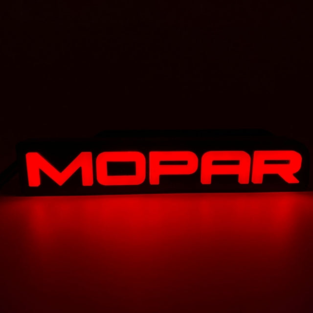 MOPAR ILLUMINATED LOGO installed by AudioZoneTX in Irving TX – car audio upgrade.