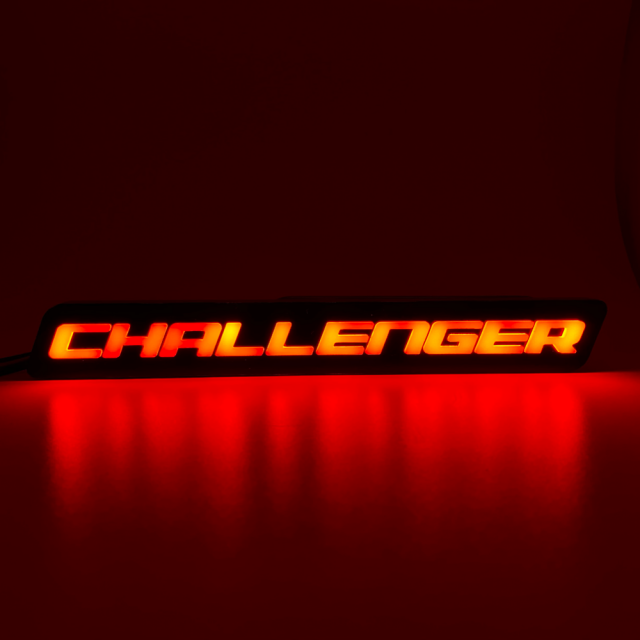 DODGE CHALLENGER ILLUMINATED LOGO DODGE installed by AudioZoneTX in Irving TX – car audio upgrade.